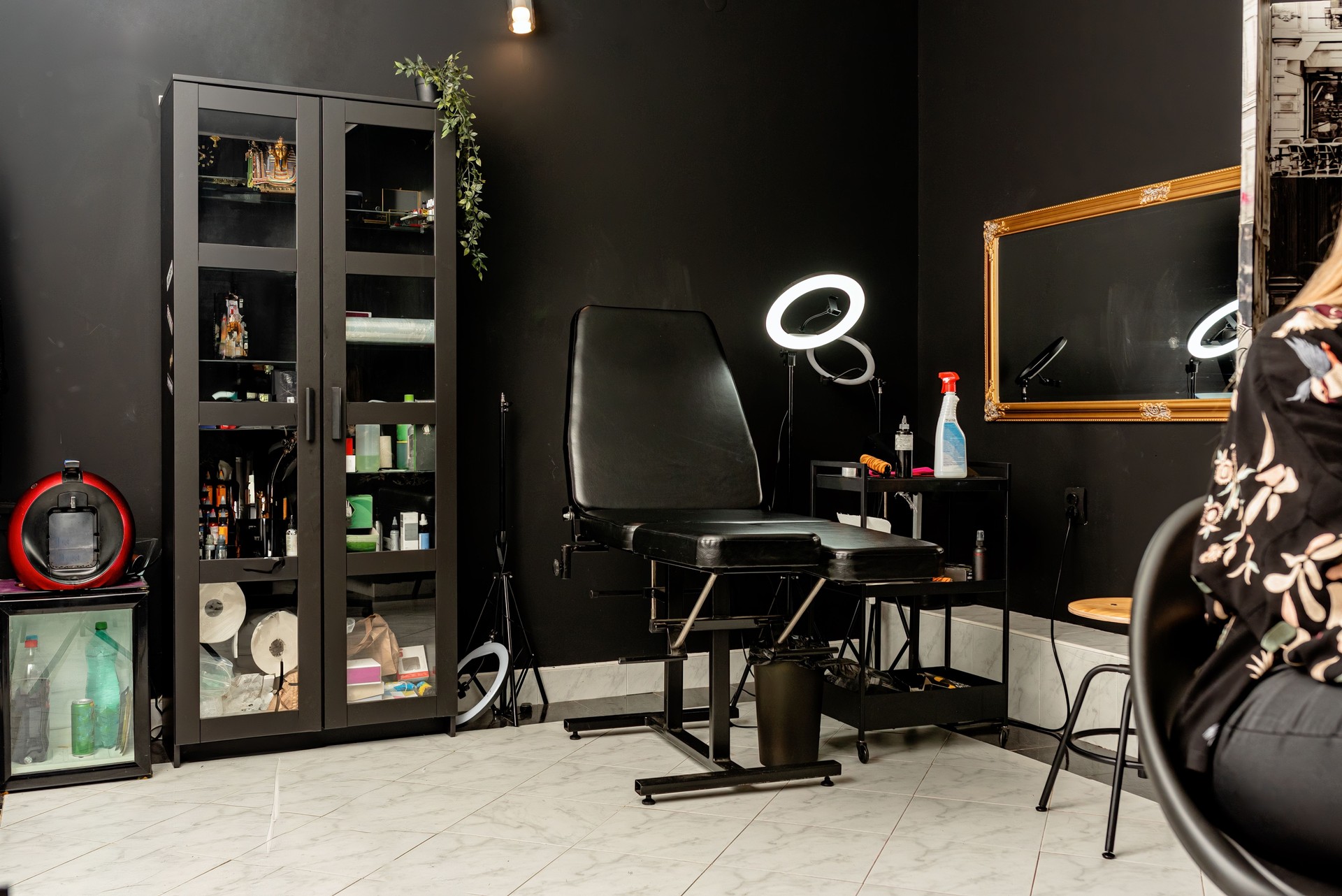 Tattoo studio interior with furniture and equipment ready for use